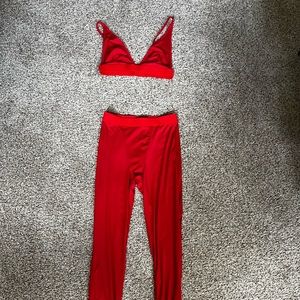Red two piece bralette and leggings set.